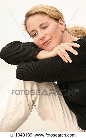 Stock Photo - black, blond, adults. Fotosearch