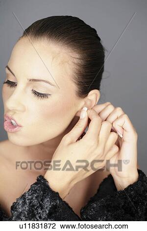 Stock Image - checkers, studio, Vogue, earring, Beauty, attach, control. Fotosearch