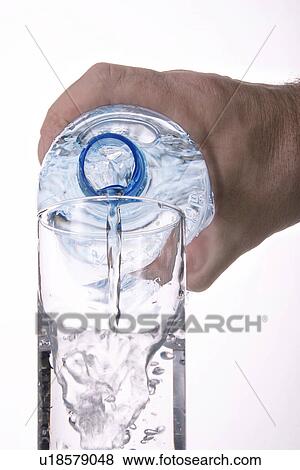 Stock Photo - bottle, hand, glass, clear, alfred. Fotosearch