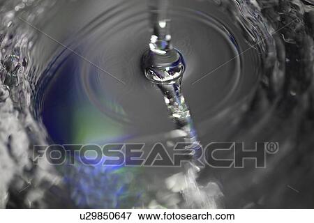 Stock Photo - strahl, aqua, background, blue, circles, drinking water, fluency. Fotosearch