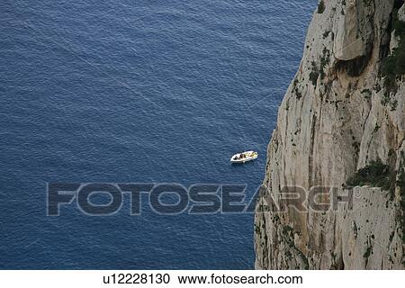 Stock Image - blue, boat, caccia, cappo, comparison, difference, dimension. Fotosearch