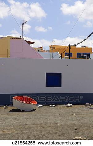 Stock Photo - vacation by the sea, blue, boat, multicolored, colorful, colourful, colored. Fotosearch