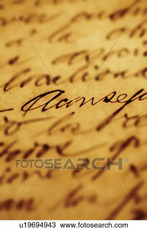 Stock Image - old, antique, newspaper, soiled, brown, aged. Fotosearch