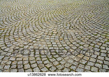Stock Photo - cobblestones, away, cobblestone, backgrounds, background, alfred. Fotosearch