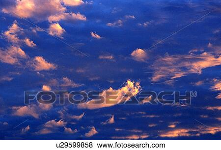 Stock Photo - clouds, background picture, calf, burgenland, blue, colorful, austria. Fotosearch
