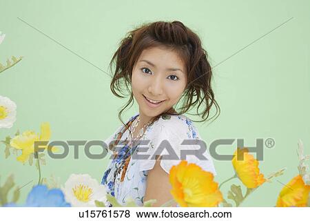Stock Photo - Close-up of a teenage girl. Fotosearch