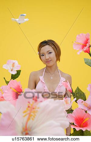 Stock Image - Portrait of a teenage girl in bikini. Fotosearch