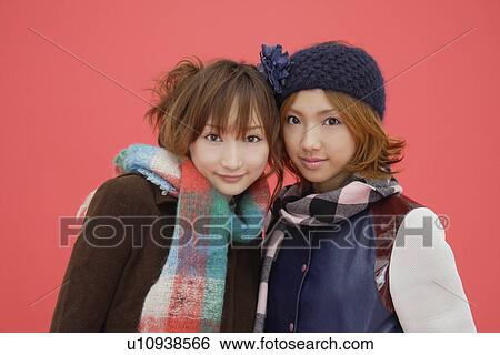 Portrait of two teenage girls in winter clothing View Large Photo Image Stock Photograph - Portrait of two teenage girls in winter clothing. Fotosearch