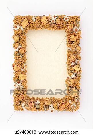 Stock Photo - A frame of beautiful flowers. Fotosearch