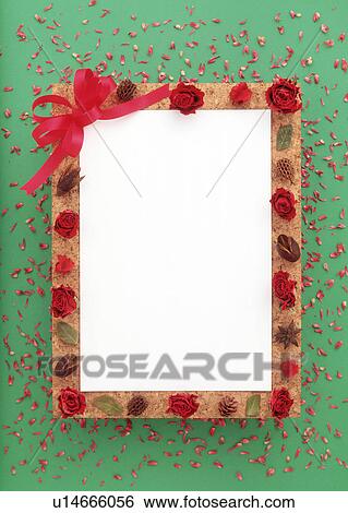 Stock Photograph - Close-up of a frame against green background. Fotosearch