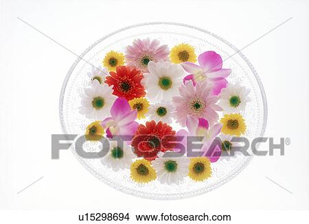 Picture - View of colorful flowers in a bowl. Fotosearch