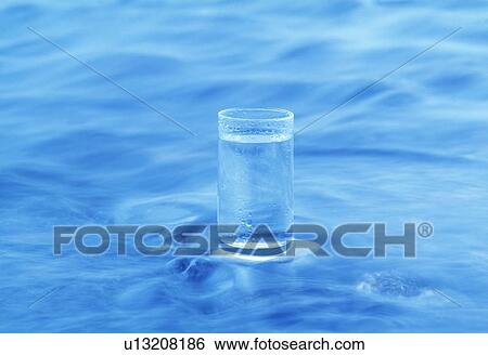 View of a glass on water (digital composite) View Large Photo Image Stock Photograph - View of a glass on water (digital composite). Fotosearch