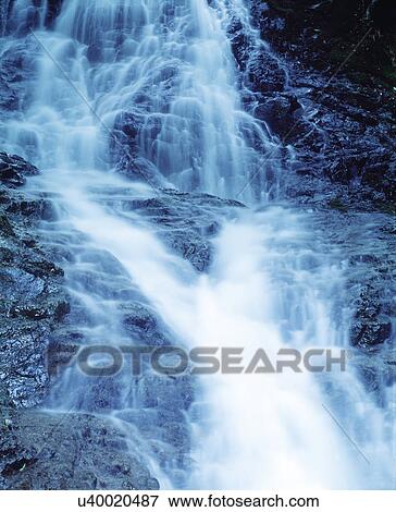 Stock Photo - View of a waterfall. Fotosearch