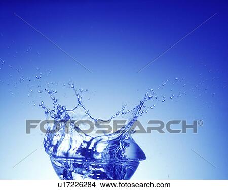 Water splashing out of glass bowl View Large Photo Image Picture - Water splashing out of glass bowl. Fotosearch
