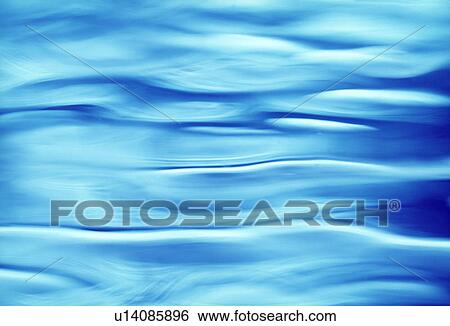 Stock Photograph - Close-up of waves on surface digital composite. Fotosearch