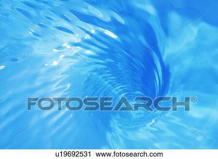 Stock Image - Close-up of whirling water. Fotosearch