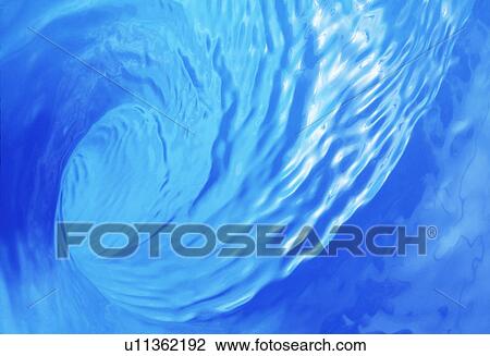 Tilted view of whirling water View Large Photo Image Stock Image - Tilted view of whirling water. Fotosearch