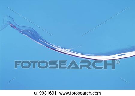 Stock Image - View of clear water against blue background. Fotosearch