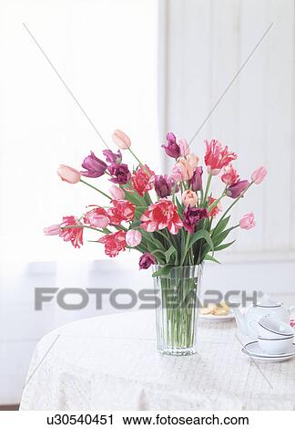 Stock Image - A bunch of flowers in a vase. Fotosearch