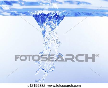 Stock Image - Inverted view of water splashing. Fotosearch