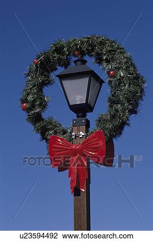 A Streetlight And A Christmas Wreath View Large Photo Image Stock Image - A Streetlight And A Christmas Wreath. Fotosearch