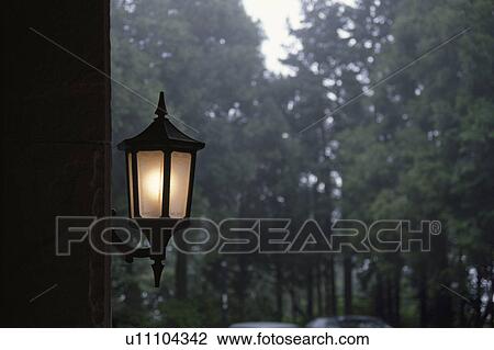Stock Image - A Streetlight And Fog. Fotosearch