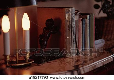 Stock Image - Antique Books Near Lamp. Fotosearch