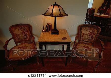 Chairs By Side Table View Large Photo Image Picture - Chairs By Side Table. Fotosearch