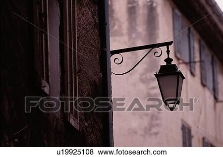Stock Photo - Street Lamp Against Buildings. Fotosearch
