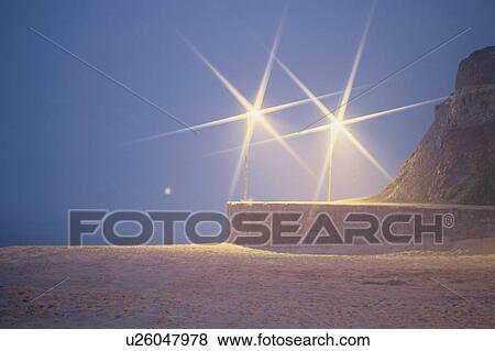 Two Streetlights On Beach View Large Photo Image Stock Photo - Two Streetlights On Beach. Fotosearch