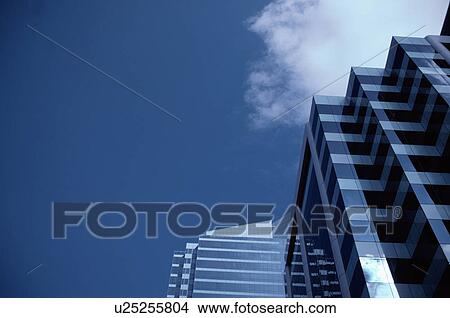 Glass Building Against Sky View Large Photo Image Picture - Glass Building Against Sky. Fotosearch