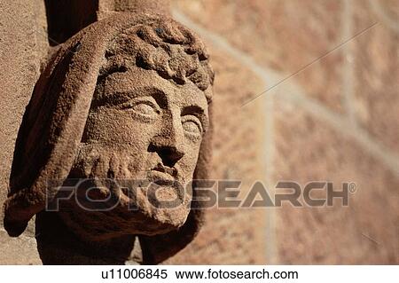 Stock Photography - Stone Relief Of Face. Fotosearch
