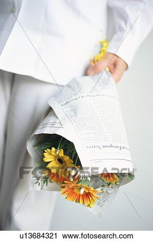A man holding flower bouquet View Large Photo Image Stock Image - A man holding flower bouquet. Fotosearch