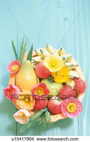 Flower arrangement with fruits View Large Photo Image Picture - Flower arrangement with fruits. Fotosearch