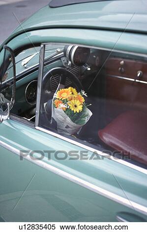 Flower bouquet in a car View Large Photo Image Stock Photography - Flower bouquet in a car. Fotosearch