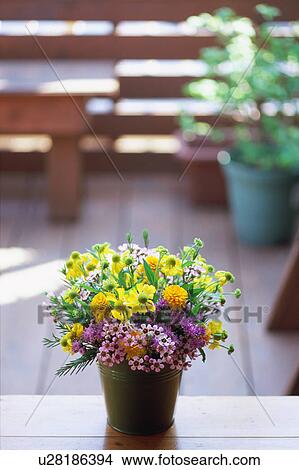 Picture - Flower bouquet in bucket. Fotosearch
