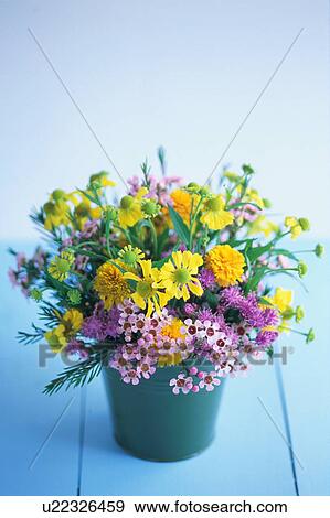 Stock Photo - Flower bouquet in bucket. Fotosearch