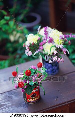 Flower bouquet in cans View Large Photo Image Stock Photography - Flower bouquet in cans. Fotosearch