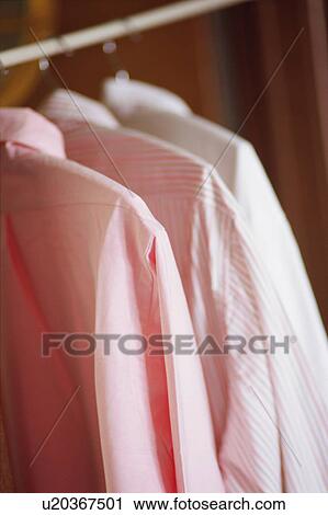Stock Image - Blouses in closet. Fotosearch
