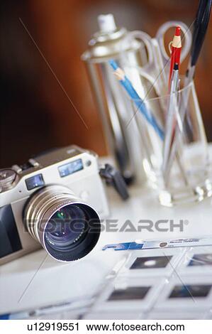 Camera and slides View Large Photo Image Stock Image - Camera and slides. Fotosearch
