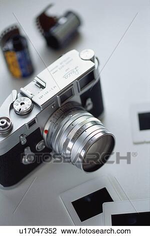 Stock Image - Camera and slides. Fotosearch