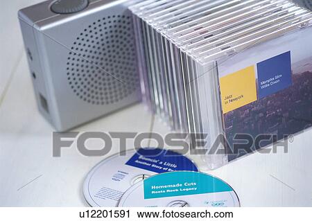 CDs and CD player View Large Photo Image Stock Image - CDs and CD player. Fotosearch