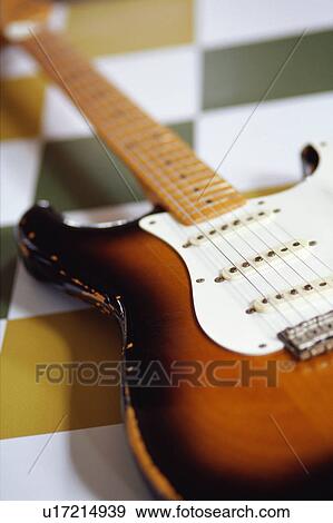 Close-up of electric guitar View Large Photo Image Stock Photo - Close-up of electric guitar. Fotosearch