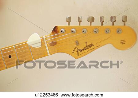 Close-up of electric guitar View Large Photo Image Stock Photograph - Close-up of electric guitar. Fotosearch