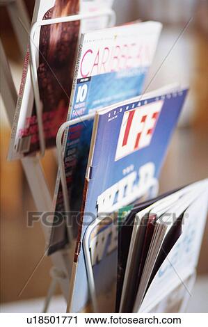 Stock Image - Magazines in rack. Fotosearch