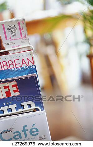 Magazines in rack View Large Photo Image Stock Photograph - Magazines in rack. Fotosearch
