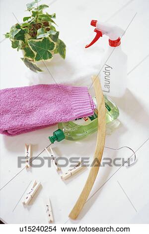 Picture - Potted plant, spray and towel. Fotosearch