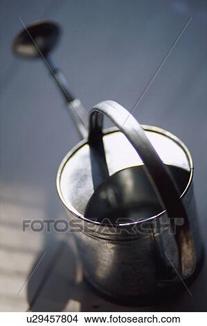 Picture - Watering can. Fotosearch