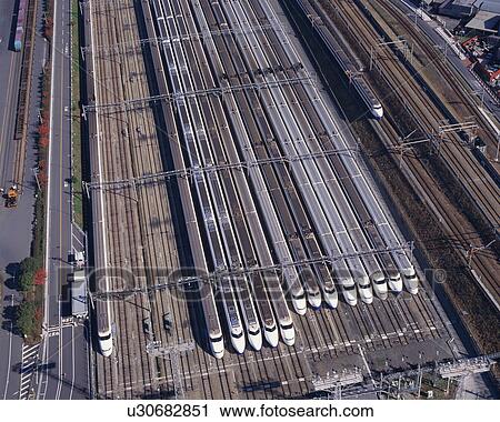 Stock Image - Aerial view of bullet trains. Fotosearch