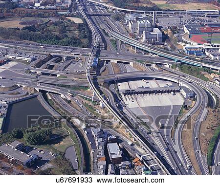 Stock Image - Aerial view of roads and flyovers in the city. Fotosearch